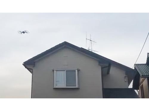 ドローン点検の様子（写真左上の機器がドローン）